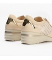 Deportivo de cuña en color crema para mujer