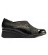 Zapato de color negro con elásticos