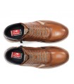 Botines con cordones elásticos en color cuero.