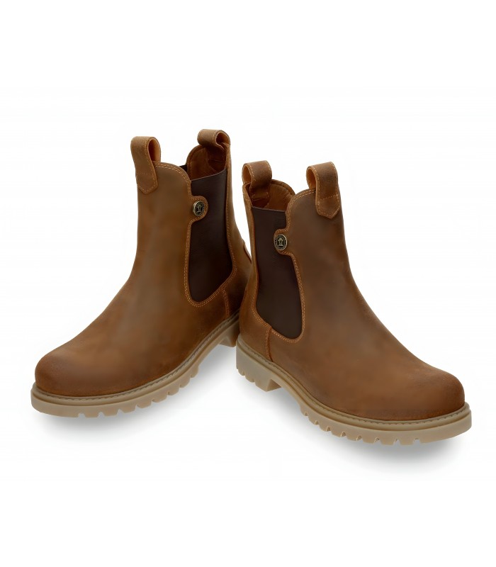 Botas estilo Chelsea en piel velour marrón con tiradores.