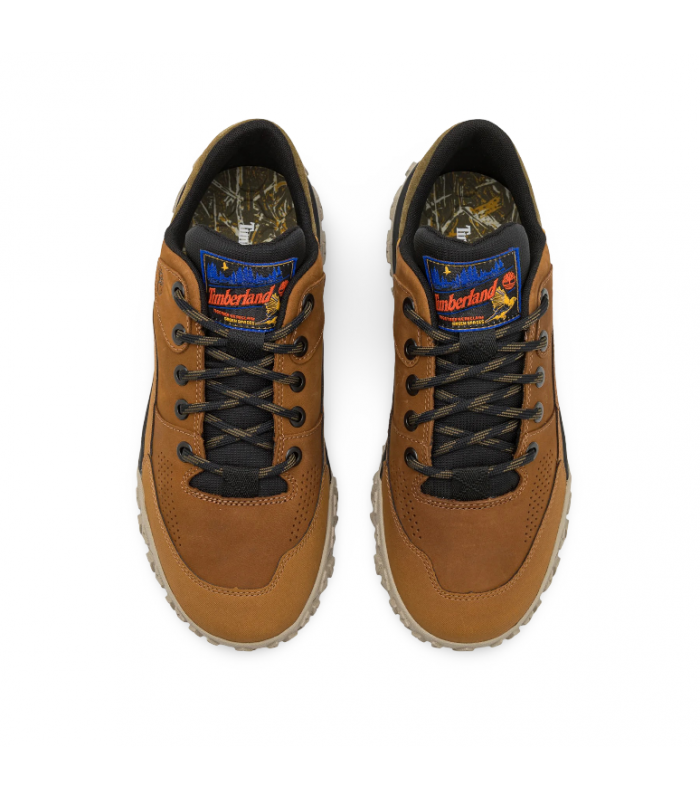 Deportivos marrones con cordones. Piel engrasada.