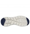 Deportivo Skechers de corte clásico en color azul marino con suela beige.