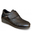 Zapatos de confort en piel negra con velcro lateral.