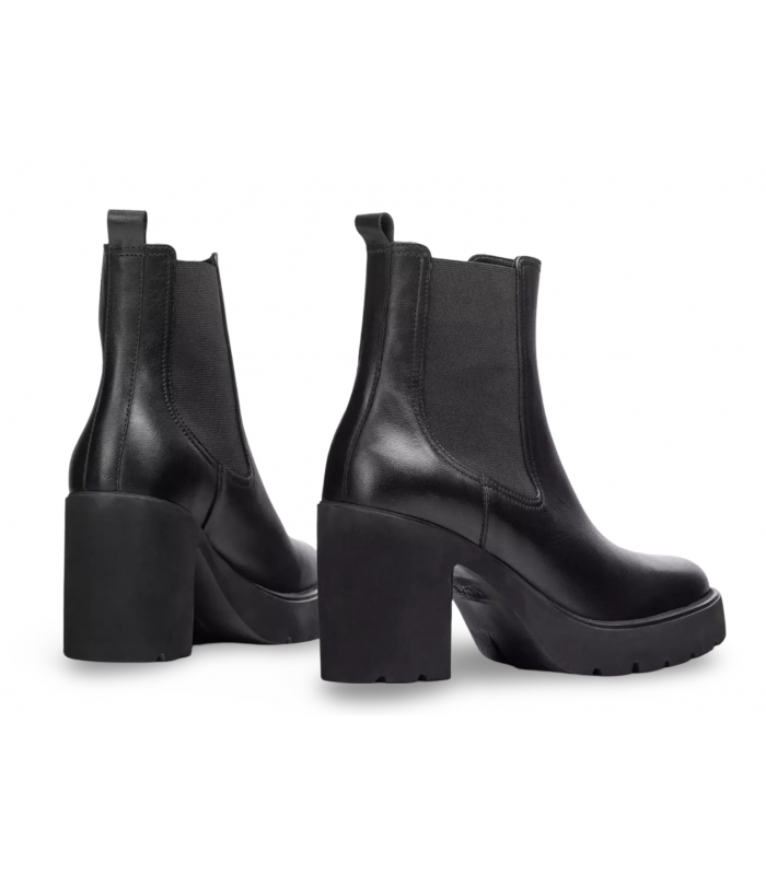 Botines Chelsea negros con tacón y plataforma.