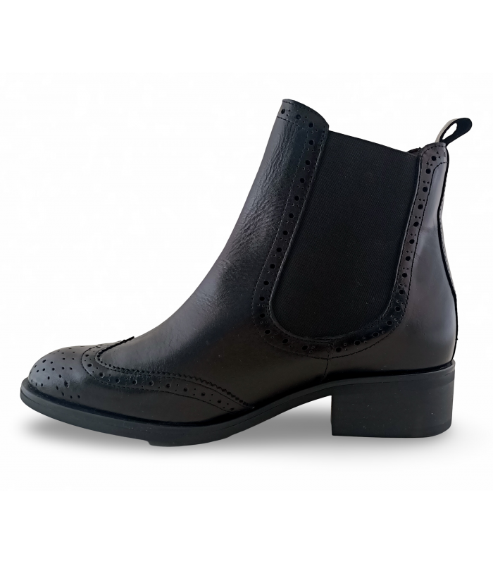 Botines estilo Chelsea con elásticos en negro.