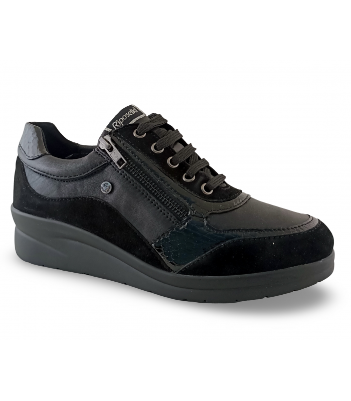 Deportivo de cuña con cordones y cremallera lateral.