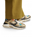 D.Franklin 347011 Gold. Zapatilla plataforma en dorado con detalles negro/blanco para un look atrevido